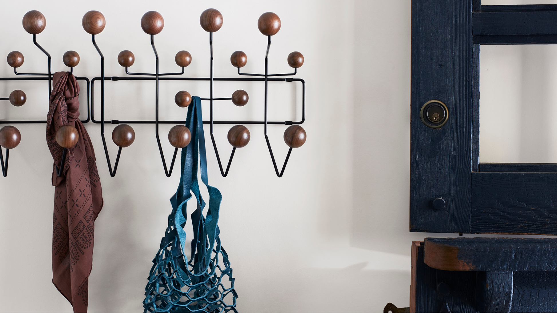 Charles and Ray Eames brought a sense of fun to midcentury design, imbuing everyday objects with unexpected whimsy. Their Hang-It-All coat rack exemplifies this approach.